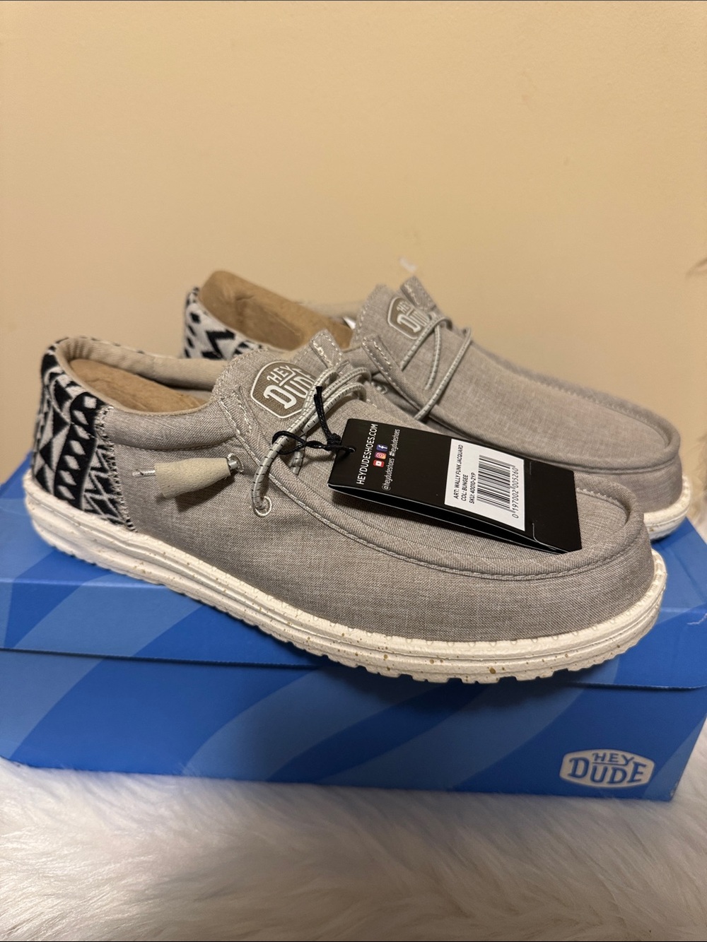 Hey Dude Wally Slip-Ons in Light Gray with Black Patterned Heel
